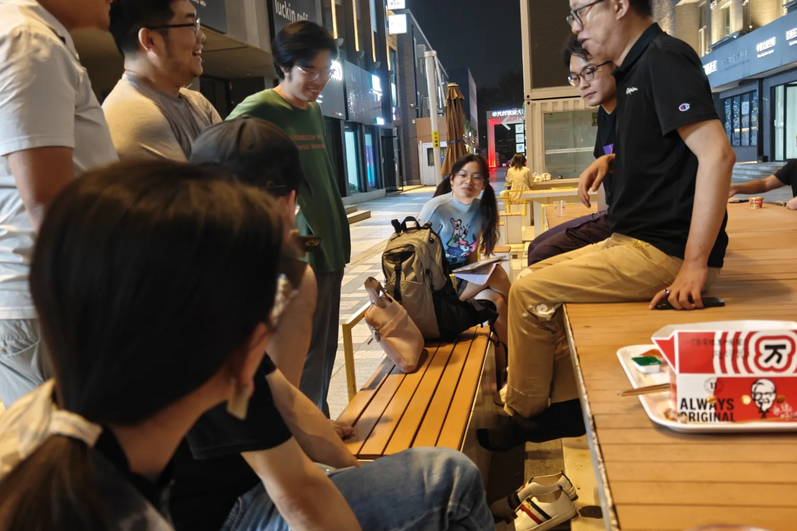 An industry gathering around the outdoor tables at AGI Bar